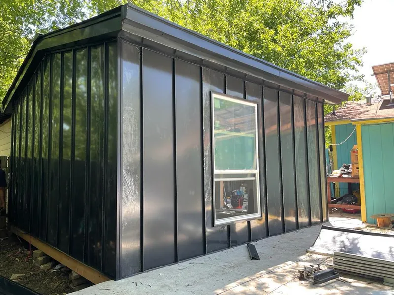 Black standing seam metal wall panels for Metal Roof Installation in Lake Magdalene